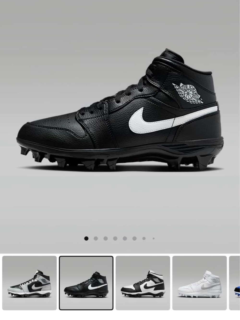 Nike Black and White High-Top Football Cleats